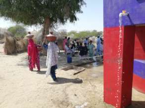 Women with water pitchers