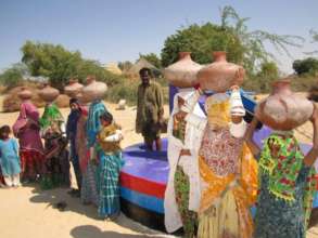 women of Thar with water pitchers on their heads