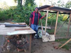 Timoci with new Niubasanga chicken house.