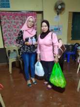 Distributing hand sanitizers to local nurses