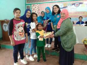 smallest mini-nurse receives her certificate