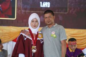 It's a long road to graduation-a dad and daughter