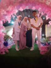 Student with family during pinning ceremony