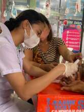 Drawing blood at community clinic for the poor