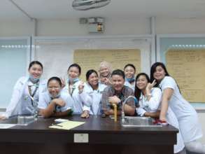 With professor in nursing school lab