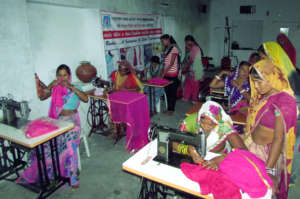 A woman learns vocational education of sewing