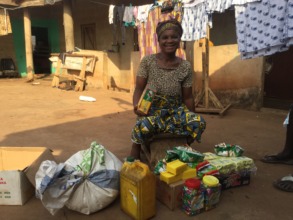 Abibata receives items to start business