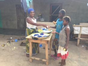 children buying from Abibata's shop
