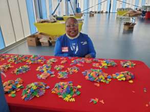 Foster Grandparent preparing remote learning bags