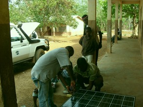 KTI students preparing for installation under close supervision