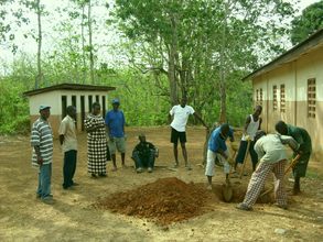 Community members digging the earthing pit