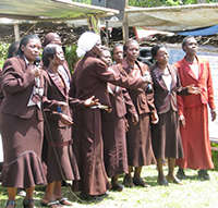 Local WMI officials at a graduation ceremony