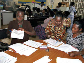 A graduating group receives formal bank loans