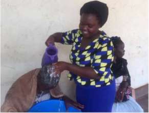 Alice washing a client's hair