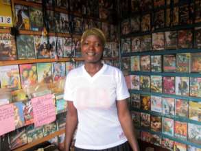 Robinah in her DVD Store