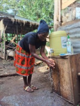 Village Woman Washing her Hands