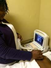 Nurse doing an ultrasound screening