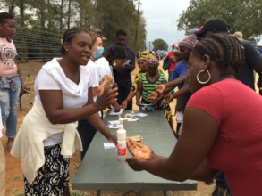 Hand wash demo by Hlokomela staff.