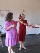 Self breast examination demo at fundraising event