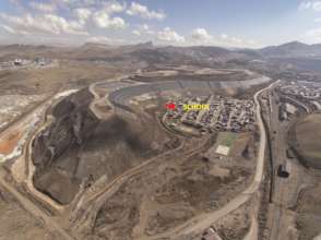 School is 10 meter far from a big mining waste