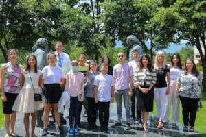 Khan contest winners with US Ambassador