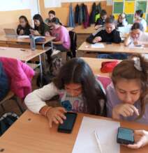 Students revising Math lessons with Khan Academy