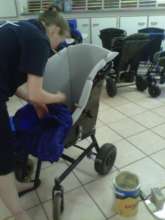 Assembling the wheelchairs for the children