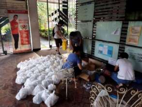 repacking care packages for victims