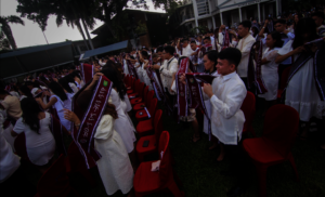 the graduates in their commencement regalia