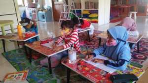 A group of 1st grader learning to write