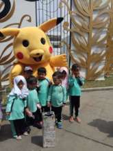 Pose with Pikachu (children favorite character)