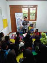 A boy read the book for his friends