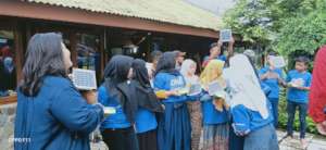 The children try to charge the lantern outside