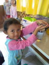 Learning to use hands sanitizer