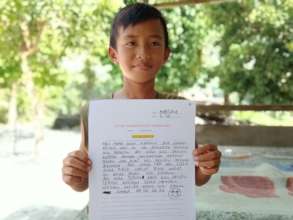 A student with his writing work