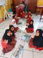 This group likes to read together on the floor
