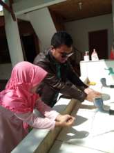 The parents teach how to wash hands properly