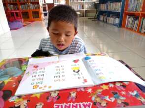 Practicing reading with Alphabet book
