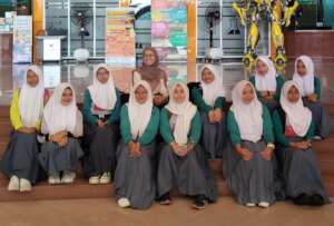 The girls exploring science with excitement!