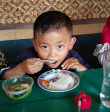 He loves his vegetable soup!