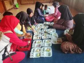 The parents at the hall: setting the  lunch