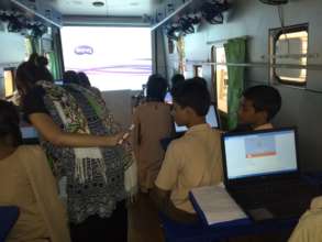 Students Learning on TOW Bus