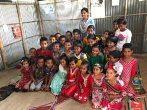 Primary School class children eager to learn