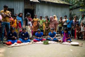 Children Rolling Cigarettes to earn income