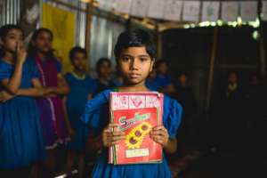 Girl with School Materials