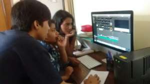 Young leaders editing their short film on Peace