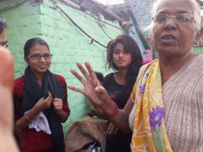 Campaigners talking to community members