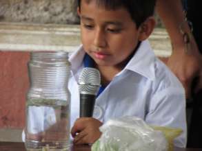 A student presenting his science project