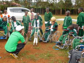Children enjoying a game on wheelchair