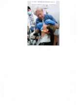 Dr lyon examing patient with glass eye